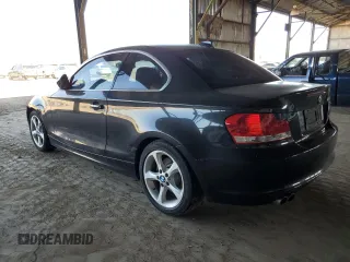 2011 BMW 1 Series 128i with VIN WBAUP7C56BVP21505, listed as a Copart auction lot 52437505 with 124,562 mi miles and Clean Title. Bid and sale history available at DreamBid. Image 2.