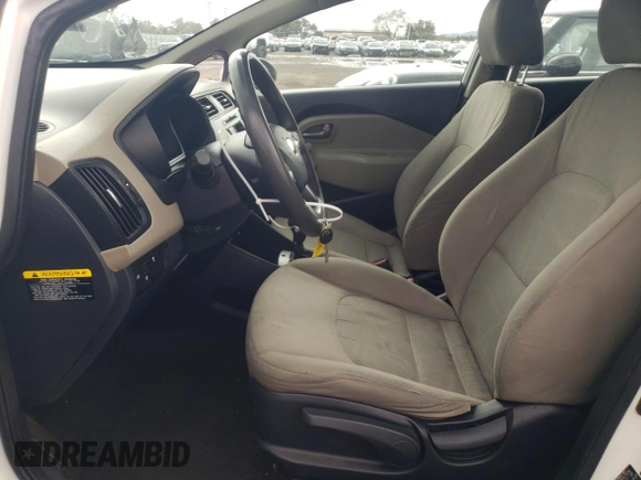 2014 Kia Rio LX with VIN KNADM5A34E6377346, listed as a Copart auction lot 82783993 with 107,160 mi miles and Salvage Title. Bid and sale history available at carsss.com. Image 7.