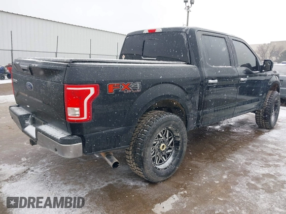 2016 Ford F-150 XLT with VIN 1FTEW1EPXGFA82102, listed as a IAAI auction lot 41560313 with 152,809 mi miles. Bid and sale history available at carsss.com. Image 4.