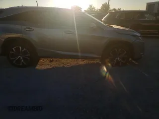 2021 Lexus RX 350L z VIN JTJHZKEA0M2019757, wystawiony jako Copart lot #71006144 z przebiegiem Nie podano mil oraz Szkoda całkowita • Salvage title. Historia ofert i sprzedaży dostępna na DreamBid. Obrazek 12.