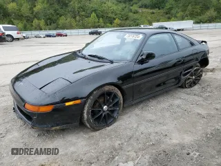 1991 Toyota MR2 z VIN JT2SW22M7M0028122, wystawiony jako Copart lot #73278724 z przebiegiem 152 523 mil mil oraz Szkody całkowita. Historia ofert i sprzedaży dostępna na DreamBid. Obrazek 1.