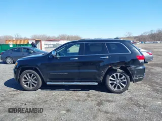2018 Jeep Grand Cherokee High Altitude with VIN 1C4RJFCT6JC102660, listed as a IAAI auction lot 41752965 with 119,841 mi miles. Bid and sale history available at carsss.com. Image 14.
