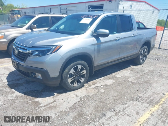 2020 Honda Ridgeline RTL with VIN 5FPYK3F5XLB019296, listed as a IAAI auction lot 42204290 with 48,197 mi miles and . Bid and sale history available at DreamBid. Image 17.