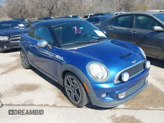 2013 MINI Coupe S with VIN WMWSX3C56DT466238, listed as a IAAI auction lot 41764156 with 147,748 mi miles and . Bid and sale history available at DreamBid. Image 1.