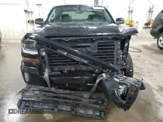 2017 Chevrolet Silverado 1500 LT with VIN 3GCUKREC2HG116505, listed as a Copart auction lot 53469345 with 118,329 mi miles and Salvage Title. Bid and sale history available at DreamBid. Image 5.