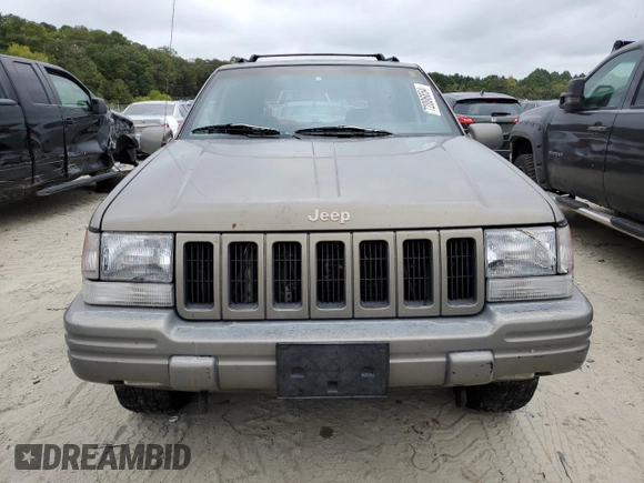 1997 Jeep Grand Cherokee Limited with VIN 1J4GZ78Y0VC599554, listed as a Copart auction lot 72006854 with 321,283 mi miles and Salvage Title. Bid and sale history available at carsss.com. Image 5.