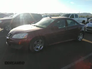 2010 Pontiac G6 w/1SB with VIN 1G2ZA5E08A4154156, listed as a IAAI auction lot 39436479 with 141,919 mi miles. Bid and sale history available at carsss.com. Image 2.