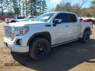 2020 GMC Sierra 1500 Denali z VIN 1GTU9FEL7LZ152659, wystawiony jako IAAI lot #41662492 z przebiegiem 101 222 mil mil oraz . Historia ofert i sprzedaży dostępna na DreamBid. Obrazek 2.