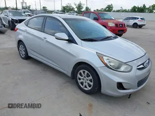2012 Hyundai Accent GLS with VIN KMHCT4AE7CU252553, listed as a IAAI auction lot 42100914 with 232,705 mi miles. Bid and sale history available at carsss.com. Image 1.