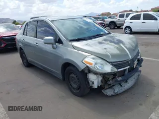 2009 Nissan Versa 1.8 S with VIN 3N1BC11E39L381507, listed as a IAAI auction lot 41956643 with 120,730 mi miles. Bid and sale history available at carsss.com. Image 1.