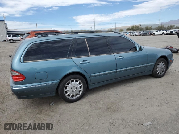 2001 Mercedes-Benz E-Class with VIN WDBJH65J01B292156, listed as a Copart auction lot 49556935 with 179,223 mi miles and Salvage Title. Bid and sale history available at carsss.com. Image 3.