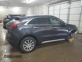 2023 Cadillac XT4 AWD Premium Luxury z VIN 1GYFZDR43PF174188, wystawiony jako Copart lot #59106355 z przebiegiem 27 530 mil mil oraz Szkoda całkowita • Salvage title. Historia ofert i sprzedaży dostępna na DreamBid. Obrazek 3.