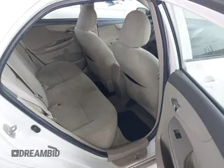 2010 Toyota Corolla with VIN 1NXBU4EE0AZ335239, listed as a IAAI auction lot 42155710 with 215,134 mi miles. Bid and sale history available at carsss.com. Image 8.