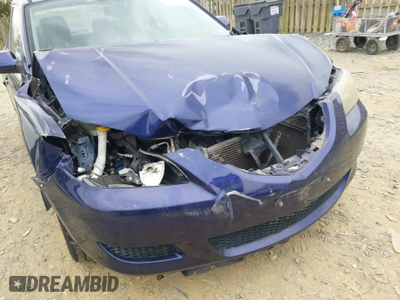 2005 Mazda 3 i with VIN JM1BK12F051341703, listed as a IAAI auction lot 42016708 with 164,188 mi miles and . Bid and sale history available at DreamBid. Image 6.