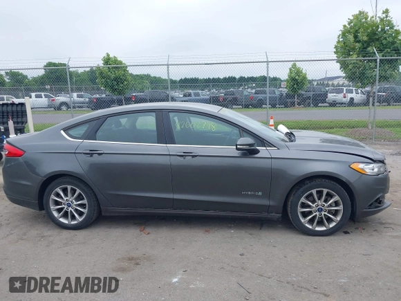 2017 Ford Fusion Hybrid SE with VIN 3FA6P0LU2HR301083, listed as a IAAI auction lot 42602798 with 89,003 mi miles and . Bid and sale history available at DreamBid. Image 13.