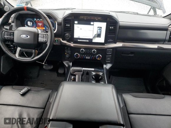 2023 Ford F-150 Raptor with VIN 1FTFW1RG0PFD16861, listed as a Copart auction lot 52928285 with 19,454 mi miles and Salvage Title. Bid and sale history available at DreamBid. Image 8.