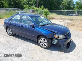 2006 Kia Spectra EX with VIN KNAFE121965354261, listed as a IAAI auction lot 39715580 with 104,071 mi miles. Bid and sale history available at carsss.com. Image 1.