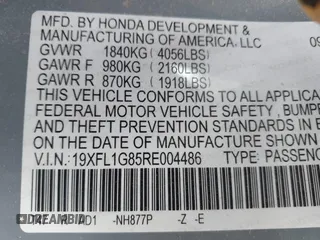 2024 Honda Civic Sport Touring z VIN 19XFL1G85RE004486, wystawiony jako IAAI lot #42052473 z przebiegiem 25 003 mil mil oraz . Historia ofert i sprzedaży dostępna na DreamBid. Obrazek 9.