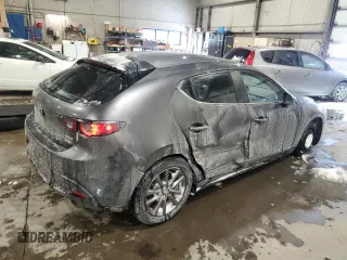 2020 Mazda 3 with VIN JM1BPBLM9L1174209, listed as a Copart auction lot 43765875 with 73,636 mi miles and Salvage Title. Bid and sale history available at DreamBid. Image 3.