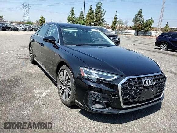 2022 Audi A8 with VIN WAULDAF86NN001617, listed as a Copart auction lot 63068504 with 25,974 mi miles and Salvage title. Bid and sale history available at DreamBid. Image 10.