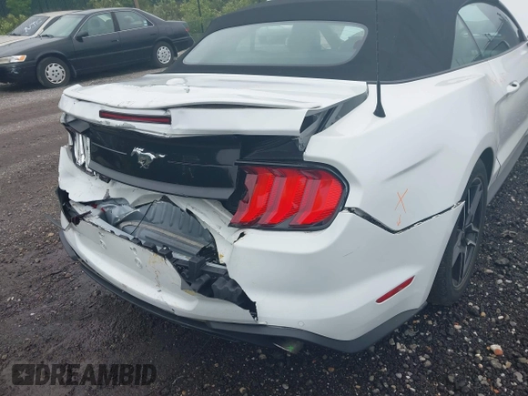 2022 Ford Mustang EcoBoost z VIN 1FATP8UH3N5104988, wystawiony jako IAAI lot #42320593 z przebiegiem 51 101 mil mil oraz . Historia ofert i sprzedaży dostępna na DreamBid. Obrazek 18.