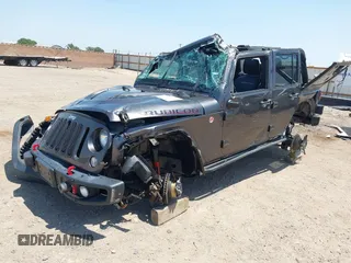 2016 Jeep Wrangler Unlimited Rubicon with VIN 1C4BJWFG7GL274673, listed as a IAAI auction lot 42532134 with 166,661 mi miles and . Bid and sale history available at DreamBid. Image 2.