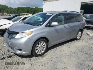2011 Toyota Sienna XLE with VIN 5TDDK3DC6BS006791, listed as a Copart auction lot 63323995 with 244,515 mi miles and Salvage title. Bid and sale history available at DreamBid. Image 1.
