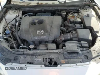 2018 Mazda 3 Grand Touring with VIN 3MZBN1W30JM165253, listed as a Copart auction lot 52159415 with 73,776 mi miles and Salvage Title. Bid and sale history available at DreamBid. Image 13.