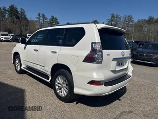 2014 Lexus GX with VIN JTJBM7FX1E5090308, listed as a IAAI auction lot 42130546 with 132,247 mi miles. Bid and sale history available at carsss.com. Image 3.