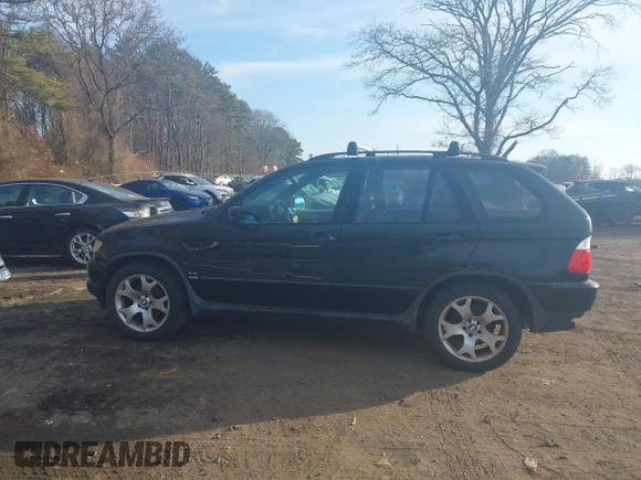 2003 BMW X5 4.4i with VIN 5UXFB33543LH43200, listed as a IAAI auction lot 41652303 with 169,250 mi miles. Bid and sale history available at carsss.com. Image 14.
