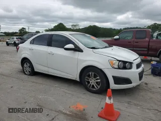 2013 Chevrolet Sonic LT with VIN 1G1JC5SH9D4137246, listed as a Copart auction lot 56001065 with 141,545 mi miles and Clean Title. Bid and sale history available at DreamBid. Image 4.
