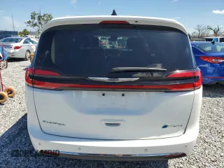 2023 Chrysler Pacifica Hybrid Touring L z VIN 2C4RC1L74PR558768, wystawiony jako Copart lot #61407555 z przebiegiem 70 387 mil mil oraz Czysty tytuł • Clean title. Historia ofert i sprzedaży dostępna na DreamBid. Obrazek 6.