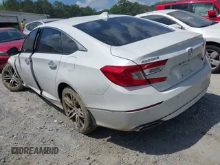 2021 Honda Accord Touring with VIN 1HGCV2F98MA015203, listed as a IAAI auction lot 42313124 with 55,530 mi miles and . Bid and sale history available at DreamBid. Image 3.