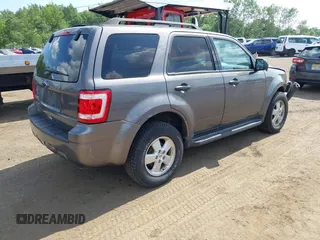 2012 Ford Escape XLT with VIN 1FMCU9D75CKC22907, listed as a IAAI auction lot 42571195 with 198,537 mi miles and . Bid and sale history available at DreamBid. Image 4.