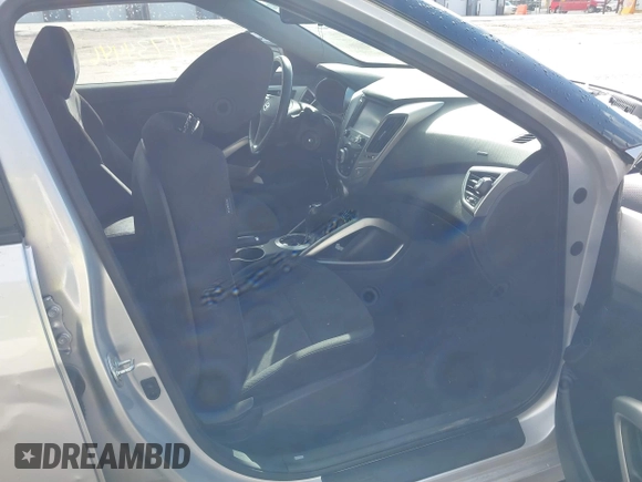 2017 Hyundai Veloster with VIN KMHTC6AD6HU310694, listed as a IAAI auction lot 41734446 with 99,432 mi miles. Bid and sale history available at carsss.com. Image 5.