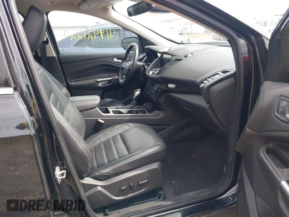 2019 Ford Escape Titanium with VIN 1FMCU9J91KUC42161, listed as a IAAI auction lot 41942122 with 100,677 mi miles and . Bid and sale history available at DreamBid. Image 5.