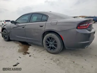 2015 Dodge Charger SE with VIN 2C3CDXBG8FH735628, listed as a Copart auction lot 53942505 with 232,859 mi miles and Clean Title. Bid and sale history available at carsss.com. Image 2.