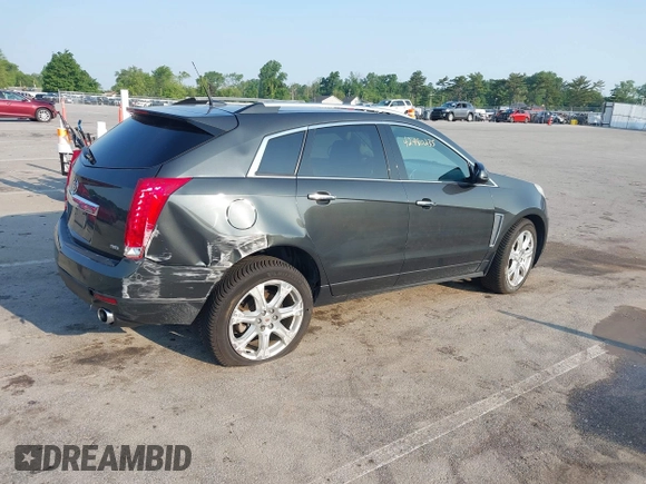 2014 Cadillac SRX Performance Collection with VIN 3GYFNFE35ES663320, listed as a IAAI auction lot 42480235 with 112,406 mi miles and . Bid and sale history available at DreamBid. Image 4.