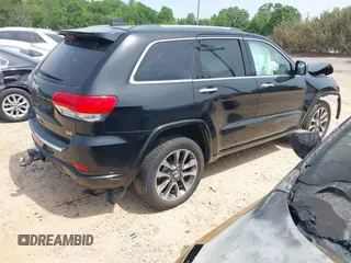 2017 Jeep Grand Cherokee Overland z VIN 1C4RJFCG4HC662884, wystawiony jako IAAI lot #42172826 z przebiegiem 79 305 mil mil oraz . Historia ofert i sprzedaży dostępna na DreamBid. Obrazek 4.