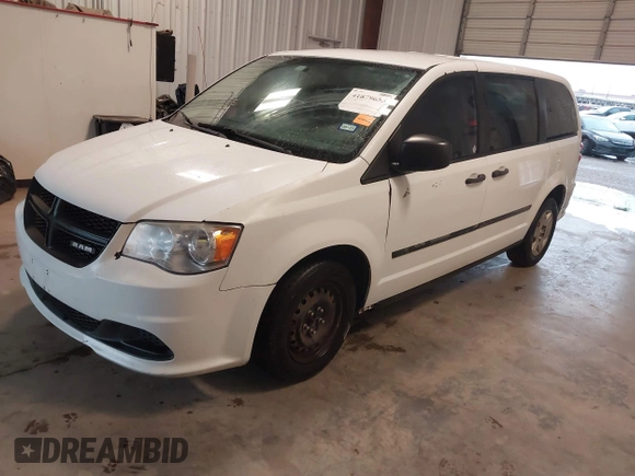 2014 Ram Cargo Van Tradesman with VIN 2C4JRGAG9ER186052, listed as a IAAI auction lot 41879655 with 239,442 mi miles. Bid and sale history available at carsss.com. Image 2.
