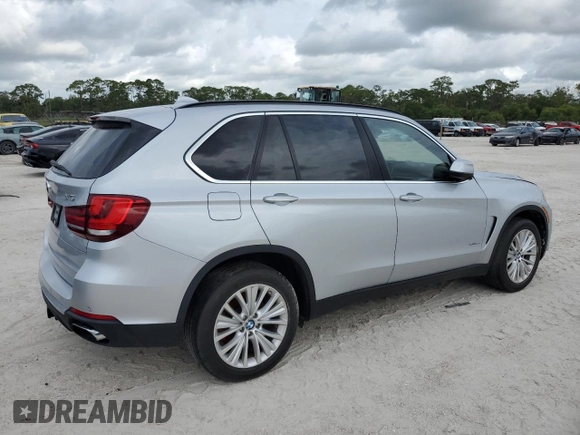 2015 BMW X5 xDrive50i with VIN 5UXKR6C51F0J74160, listed as a Copart auction lot 79337044 with 143,436 mi miles and Salvage title. Bid and sale history available at DreamBid. Image 3.