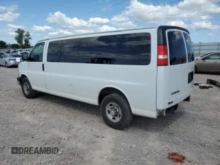 2013 Chevrolet Express Passenger LT with VIN 1GAZG1FG9D1189947, listed as a Copart auction lot 54183165 with 84,745 mi miles and Salvage title. Bid and sale history available at DreamBid. Image 2.