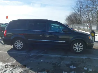 2016 Chrysler Town & Country Touring with VIN 2C4RC1BG7GR231704, listed as a IAAI auction lot 41306140 with 165,890 mi miles. Bid and sale history available at carsss.com. Image 13.