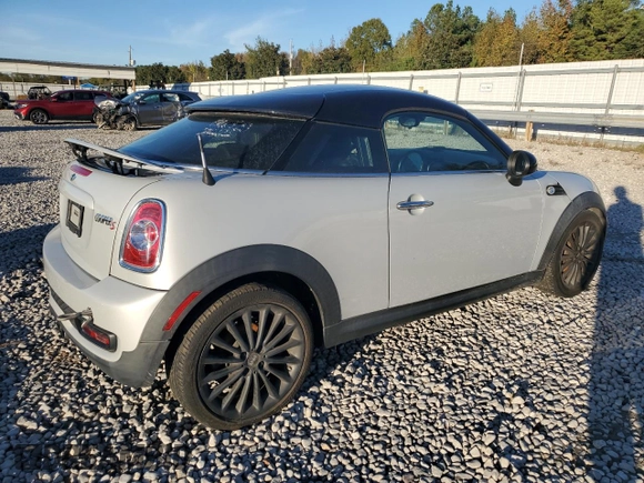 2013 MINI Coupe S z VIN WMWSX3C56DT466756, wystawiony jako Copart lot #80542054 z przebiegiem 95 135 mil mil oraz Szkoda całkowita • Salvage title. Historia ofert i sprzedaży dostępna na DreamBid. Obrazek 3.
