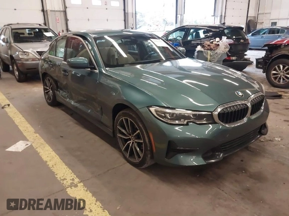 2021 BMW 3 Series 330i xDrive with VIN 3MW5R7J02M8B48226, listed as a IAAI auction lot 41637655 with 33,853 mi miles. Bid and sale history available at carsss.com. Image 1.