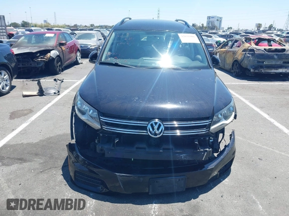 2015 Volkswagen Tiguan SE with VIN WVGAV7AX8FW542393, listed as a IAAI auction lot 42631986 with 132,168 mi miles and . Bid and sale history available at DreamBid. Image 13.