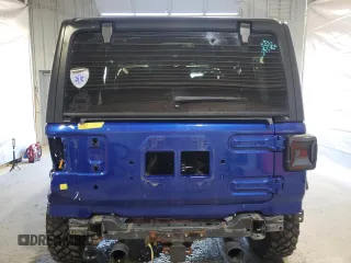 2020 Jeep Wrangler Unlimited Black and Tan with VIN 1C4HJXDG1LW267312, listed as a Copart auction lot 49658135 with 66,624 mi miles and Salvage title. Bid and sale history available at DreamBid. Image 6.