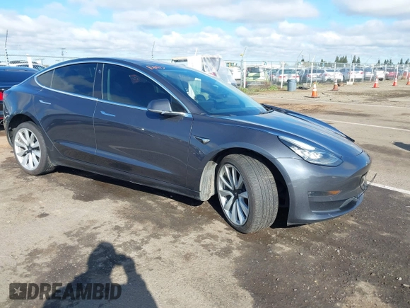 2018 Tesla Model 3 Long Range Battery with VIN 5YJ3E1EA4JF006036, listed as a IAAI auction lot 41934680 with 115,649 mi miles and . Bid and sale history available at DreamBid. Image 1.