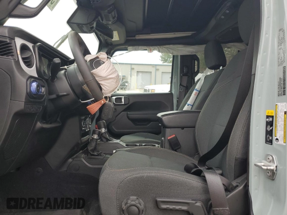 2024 Jeep Wrangler Sport S with VIN 1C4PJXDG6RW229336, listed as a Copart auction lot 51260335 with 5,198 mi miles and Salvage Title. Bid and sale history available at DreamBid. Image 7.