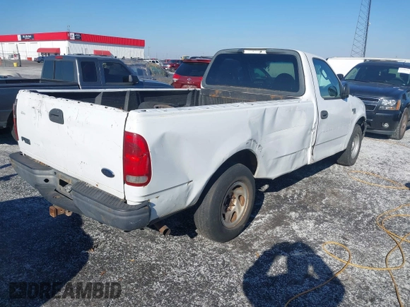 2003 Ford F-150 XL with VIN 1FTRF17W13NB65293, listed as a IAAI auction lot 41264978 with Not Provided miles and . Bid and sale history available at DreamBid. Image 4.
